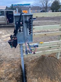 Temporary power pole set at a construction site